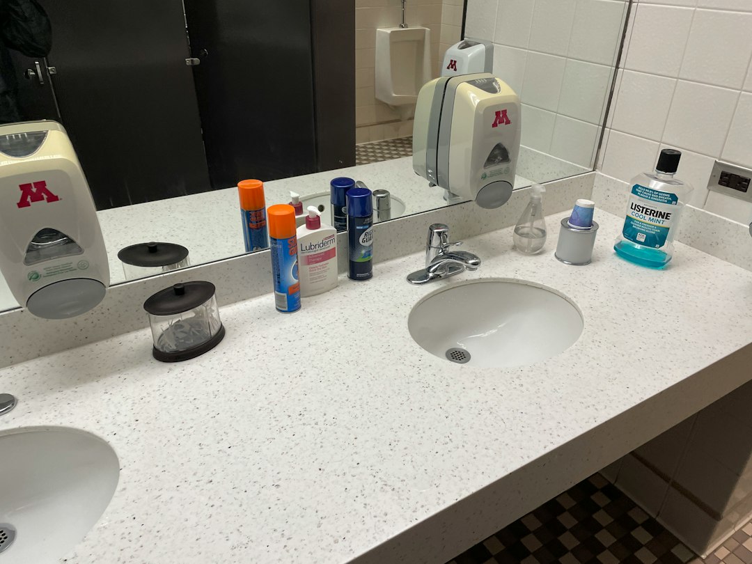 A bathroom counter with a lot of personal care items on it in Temecula, CA